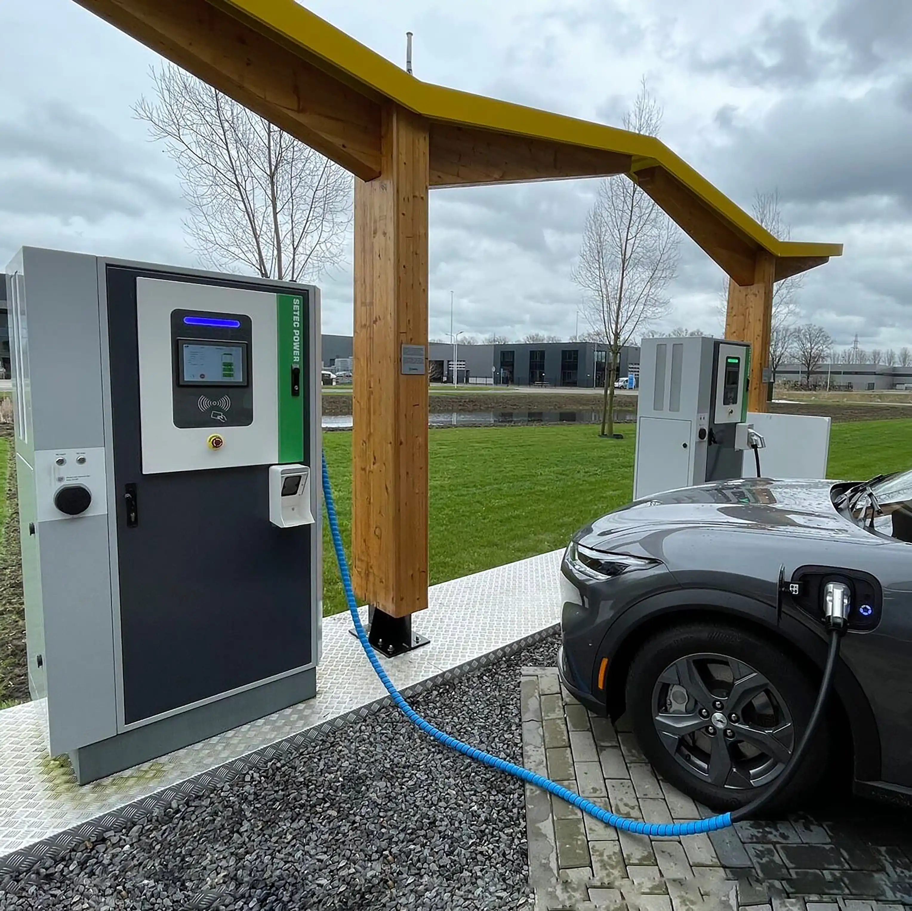 PowerBox installed in a custom frame, providing stationary charging service for an electric vehicle