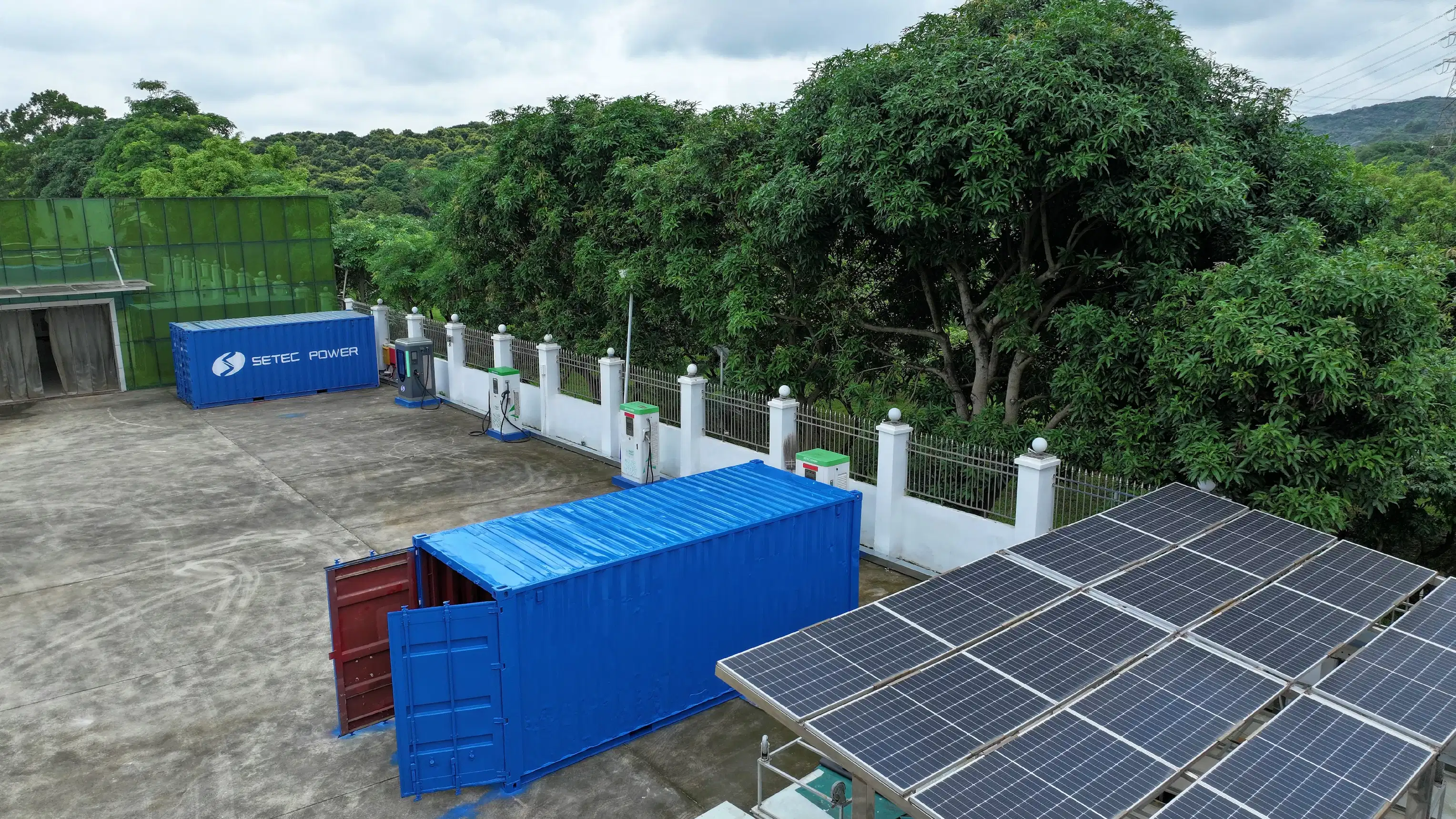 Containerized mobile EV charging solution with solar power and DC fast chargers